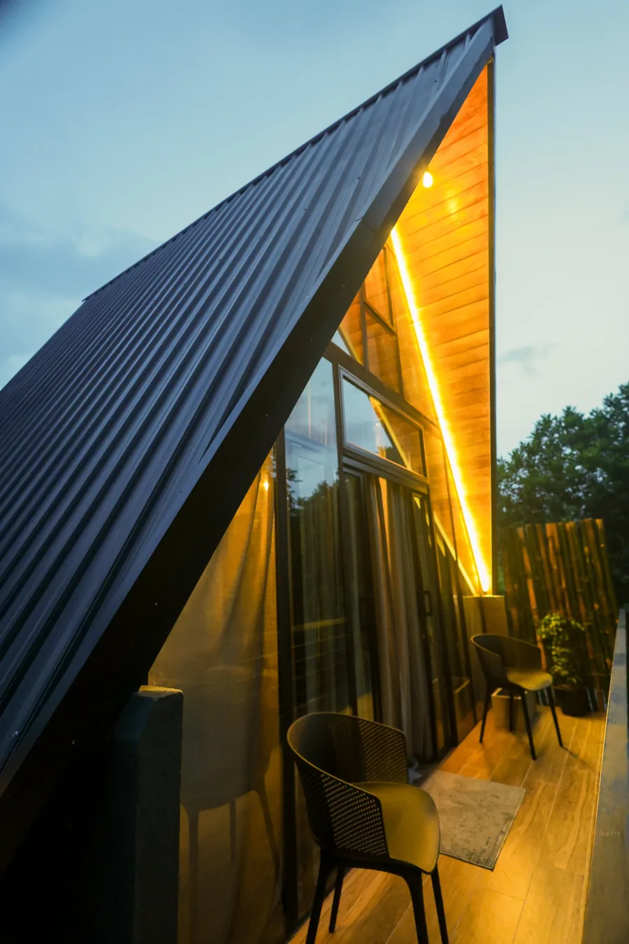 Forest Face Lodge A-frame cabin at dusk
