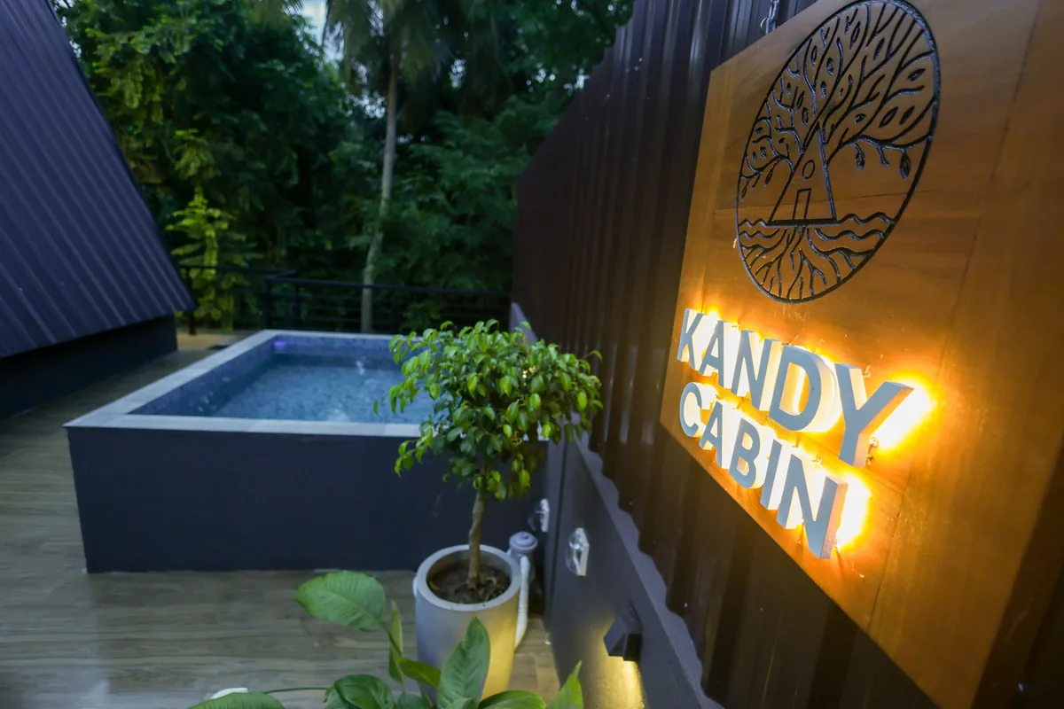 Plunge pool beside the Kandy Cabin sign at Forest Face Lodge